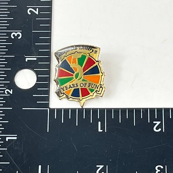 California Lottery 5 Years Of Fun Enamel Pin Gold Tone Multicolor Wheel Badge - Picture 1 of 2